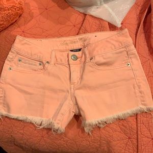 Neon American Eagle cut off shorts!